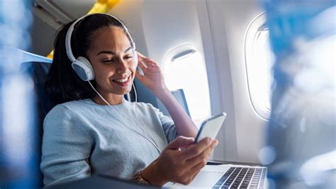 how to listen to music on a plane